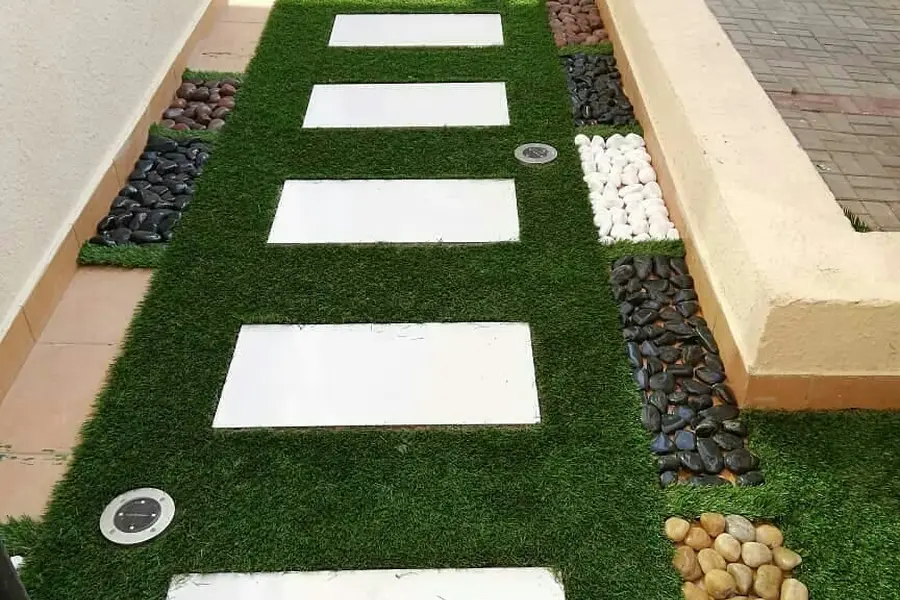 Walkways and turf with an irrigation network in a landscaped garden — KHB Steel Hangars & Construction